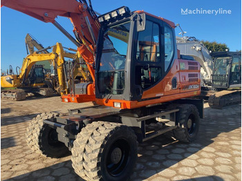 Колёсный экскаватор DOOSAN