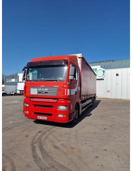 Тентованный грузовик MAN TGA 16.380