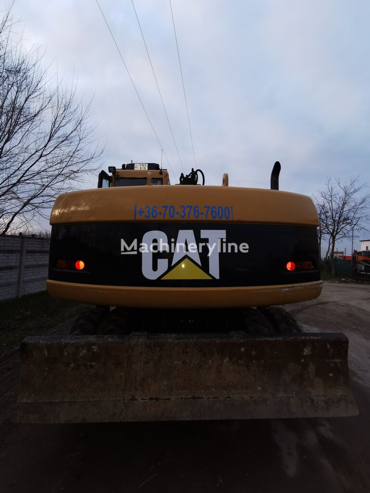 Колёсный экскаватор Caterpillar M316 C: фото 7