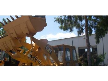 Гусеничный погрузчик Caterpillar 953C
