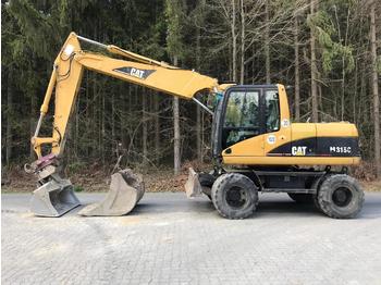 Колёсный экскаватор CATERPILLAR M315C - CAT M 315C