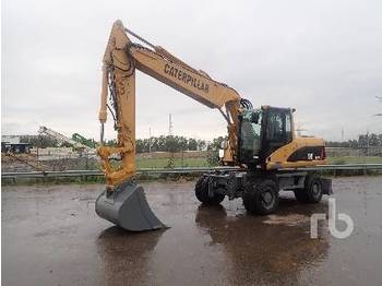 Колёсный экскаватор CATERPILLAR M318C