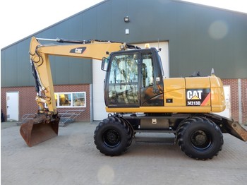 Колёсный экскаватор Caterpillar 313D