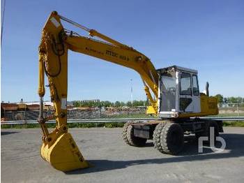 Колёсный экскаватор ETEC 815