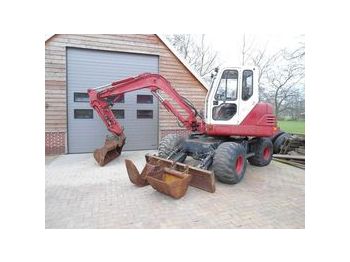 IHI 55
- Колёсный экскаватор