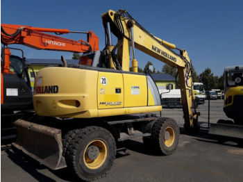 Колёсный экскаватор New Holland MH Plus