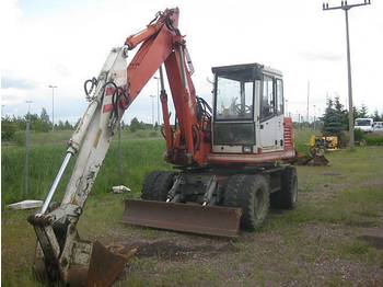 O & K MH 2.8 C - Колёсный экскаватор