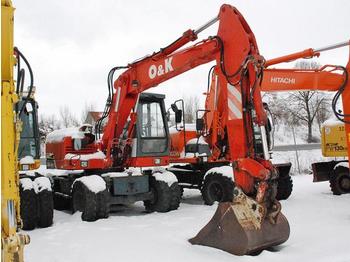 O & K MH City - Колёсный экскаватор
