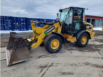 Caterpillar 906M - колёсный погрузчик