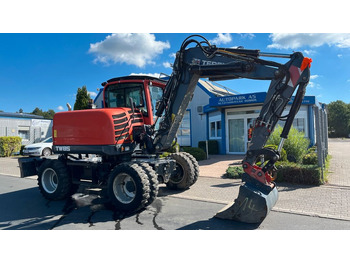 Колёсный экскаватор TEREX