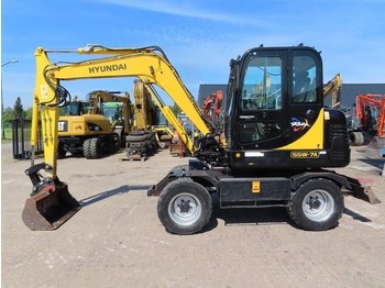 Колёсный экскаватор Hyundai Robex 55W-7A: фото 1 Колёсный экскаватор Hyundai Robex 55W-7A: фото 1