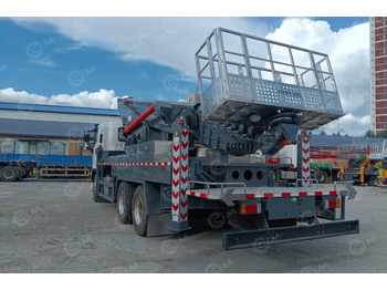 Новый Автовышка Автовышка Qingling GKS56 на шасси ISUZU 4Х2 дв 221Kw высота подъёма 56м, 2025г: фото 3