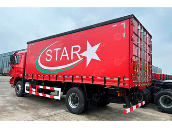 Тентованный грузовик