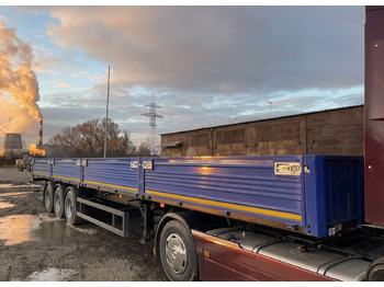 Новый Полуприцеп бортовой/ Платформа МАЗ 975800-2010: фото 3 Новый Полуприцеп бортовой/ Платформа МАЗ 975800-2010: фото 3