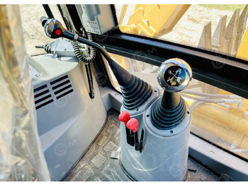 Новый Экскаватор-погрузчик Yugong 45-25: фото 3 Новый Экскаватор-погрузчик Yugong 45-25: фото 3