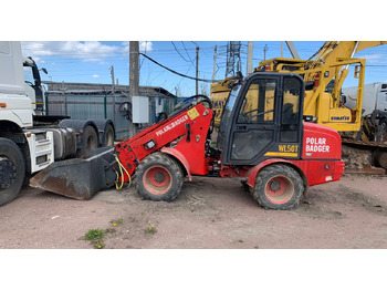 Компактный фронтальный погрузчик