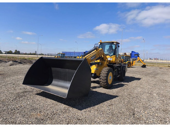 Телескопический фронтальный погрузчик