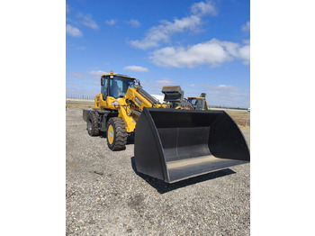 Телескопический фронтальный погрузчик