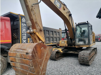 Гусеничный экскаватор CATERPILLAR 323