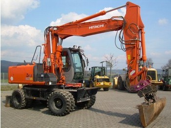 Колёсный экскаватор Hitachi ZX 160 W: фото 1 Колёсный экскаватор Hitachi ZX 160 W: фото 1