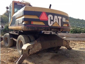 Колёсный экскаватор CAT 320: фото 1 Колёсный экскаватор CAT 320: фото 1