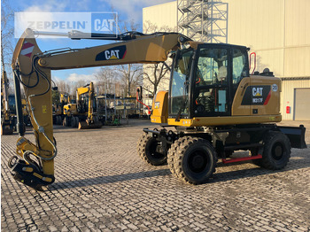 Колёсный экскаватор CATERPILLAR