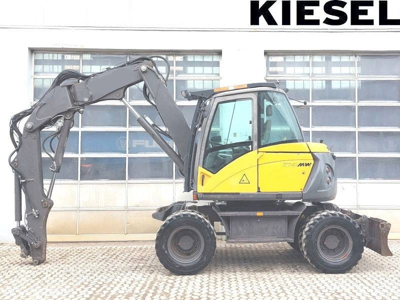 Mecalac 714 MW - Колёсный экскаватор: фото 1 Mecalac 714 MW - Колёсный экскаватор: фото 1