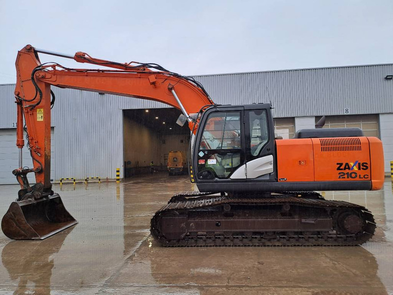Hitachi ZX210LC-5B - Гусеничный экскаватор: фото 1 Hitachi ZX210LC-5B - Гусеничный экскаватор: фото 1