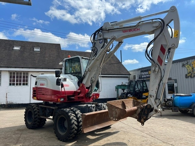Takeuchi TB295W - Колёсный экскаватор: фото 2 Takeuchi TB295W - Колёсный экскаватор: фото 2