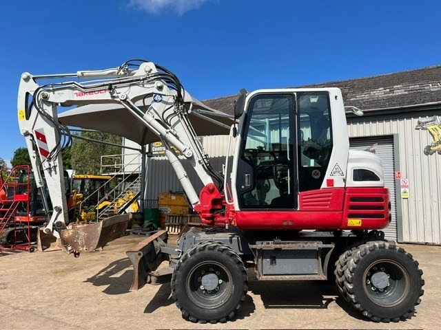 Takeuchi TB295W - Колёсный экскаватор: фото 5 Takeuchi TB295W - Колёсный экскаватор: фото 5