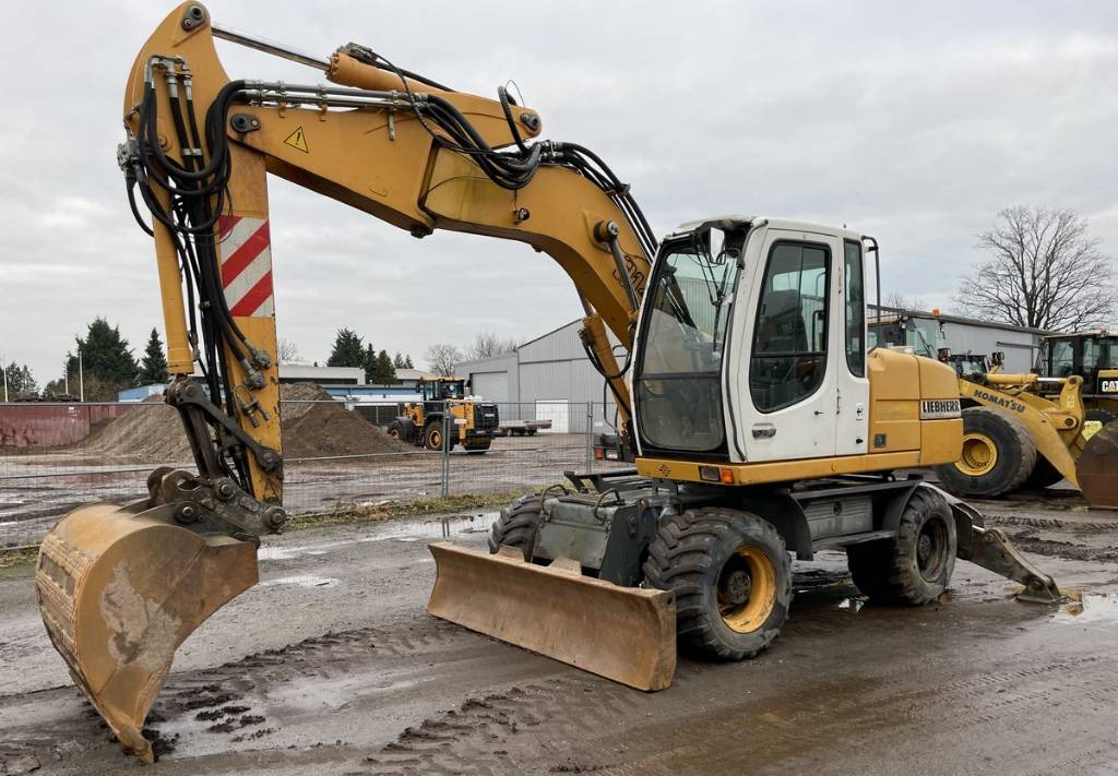 Liebherr A314 All hydr. lines 3 buckets SW 33- 30 Km/h - Колёсный экскаватор: фото 1 Liebherr A314 All hydr. lines 3 buckets SW 33- 30 Km/h - Колёсный экскаватор: фото 1