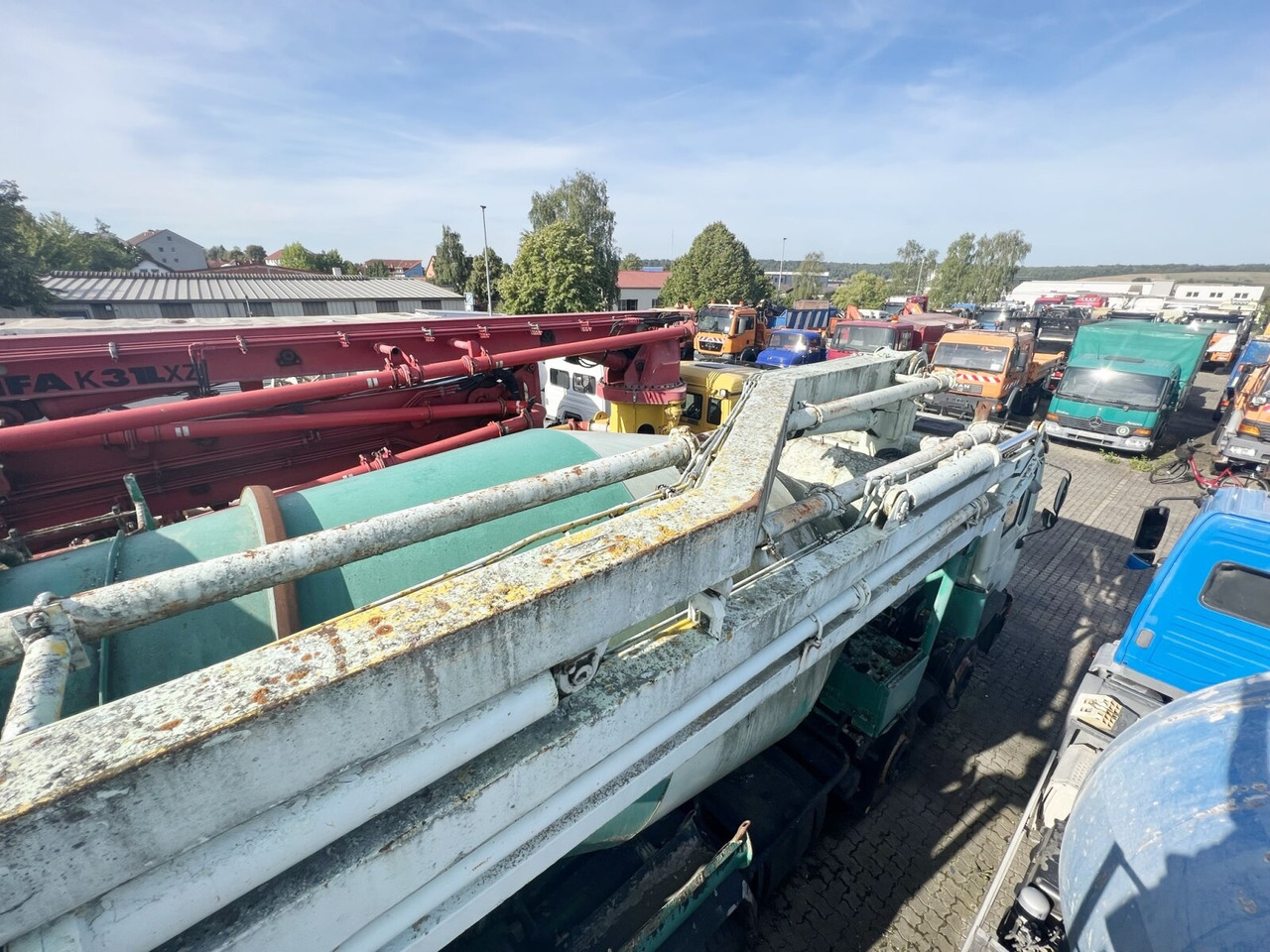 MAN 33.292 8x4 33.292 8x4 Mischer Stetter 7m³ mit Pumpe Schwing 21m, 6-Zylinder - Автобетоносмеситель: фото 4 MAN 33.292 8x4 33.292 8x4 Mischer Stetter 7m³ mit Pumpe Schwing 21m, 6-Zylinder - Автобетоносмеситель: фото 4
