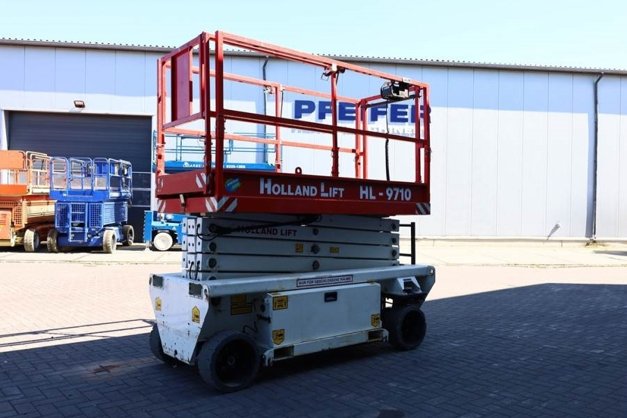 Holland Lift Ecostar HL-9710 Electric, 12m Working Height, 325k - Ножничный подъемник: фото 2 Holland Lift Ecostar HL-9710 Electric, 12m Working Height, 325k - Ножничный подъемник: фото 2