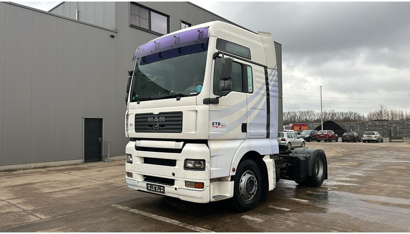 MAN TGA 18.440 (PTO / POMPE HYDRAULIQUE / MANUAL GEARBOX / BOITE MANUELLE) - Тягач: фото 1 MAN TGA 18.440 (PTO / POMPE HYDRAULIQUE / MANUAL GEARBOX / BOITE MANUELLE) - Тягач: фото 1