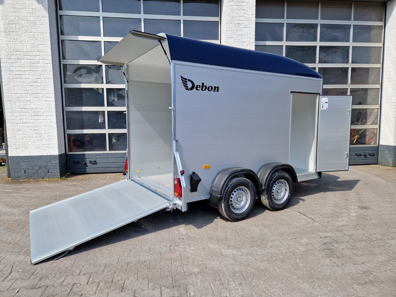 Cargo Roadster 500 312x167x199cm Alu Poly royal blue Seitentür Pullman 100km/H 2000kg Modell 2024 - Прицеп-фургон: фото 1 Cargo Roadster 500 312x167x199cm Alu Poly royal blue Seitentür Pullman 100km/H 2000kg Modell 2024 - Прицеп-фургон: фото 1