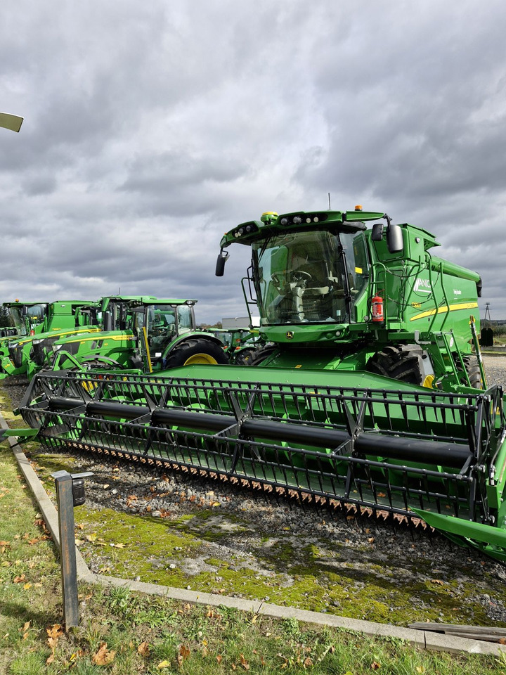 John Deere T560 - Зерноуборочный комбайн: фото 1