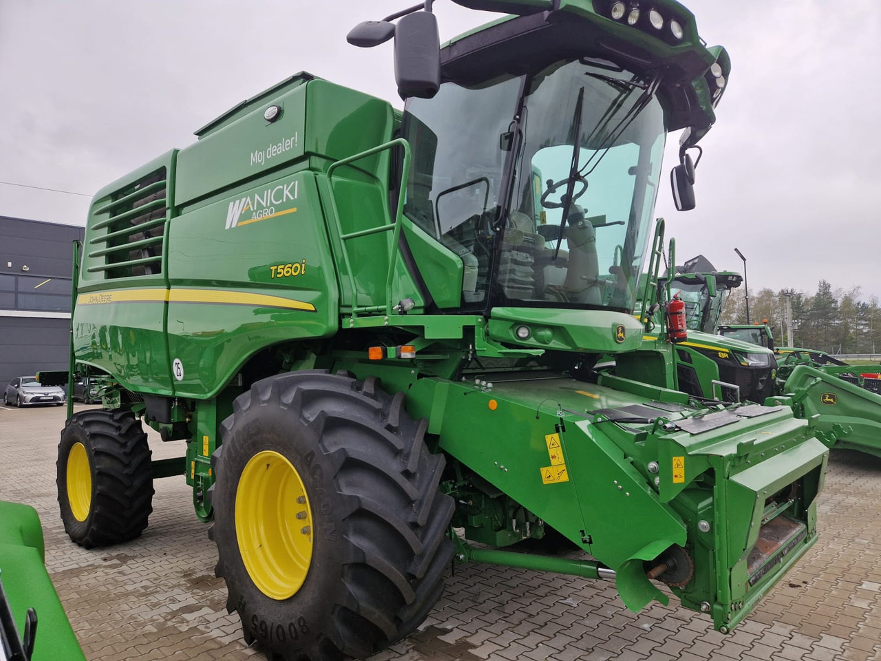 John Deere T560I - Зерноуборочный комбайн: фото 1