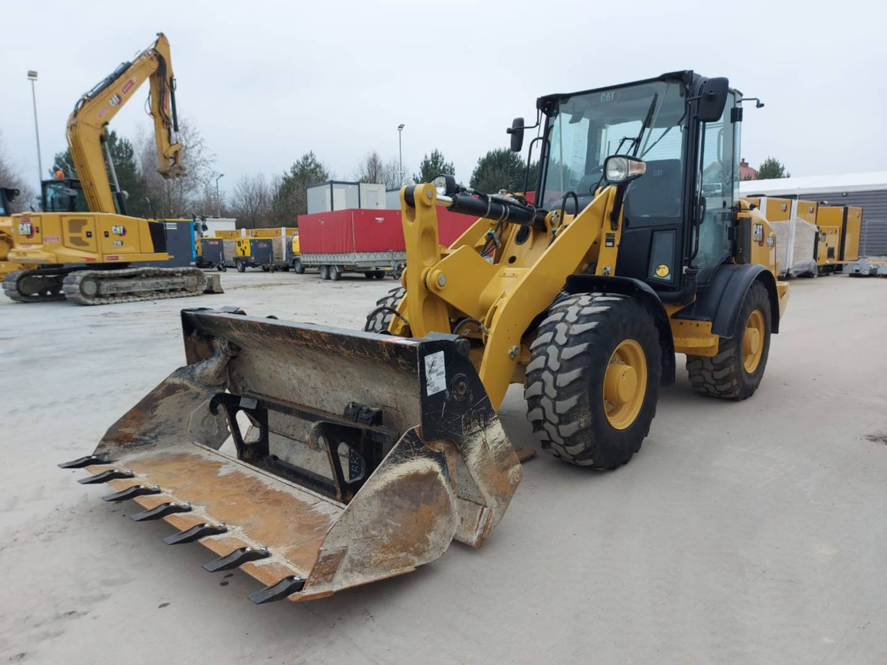 CAT 906M - Колёсный погрузчик: фото 1