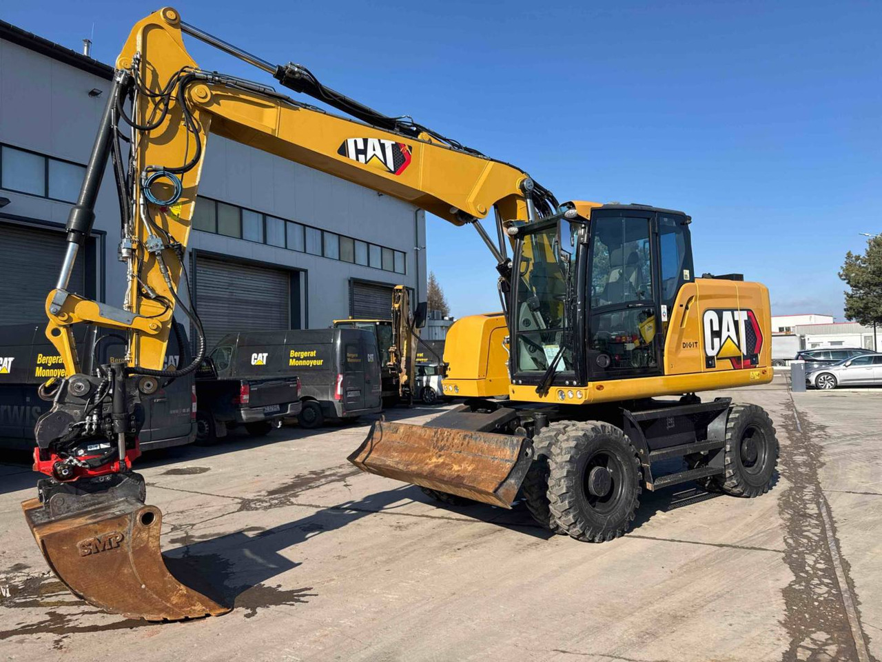 CAT M314F - Колёсный экскаватор: фото 1