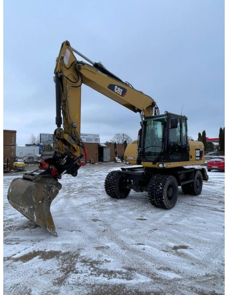 CAT M315D - Колёсный экскаватор: фото 1