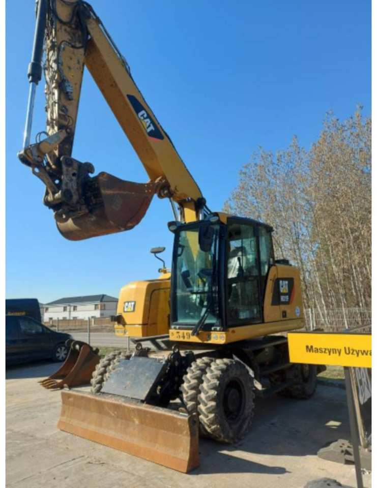 CAT M315F - Колёсный экскаватор: фото 1 CAT M315F - Колёсный экскаватор: фото 1