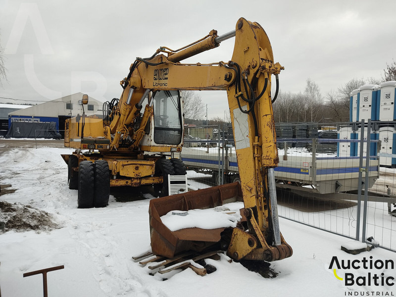 Liebherr 902 Litronic - Колёсный экскаватор: фото 1 Liebherr 902 Litronic - Колёсный экскаватор: фото 1