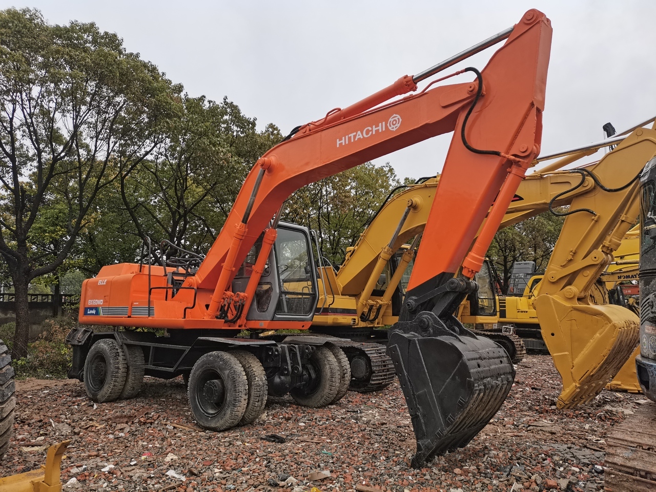 HITACHI EX160WD - Колёсный экскаватор: фото 1 HITACHI EX160WD - Колёсный экскаватор: фото 1