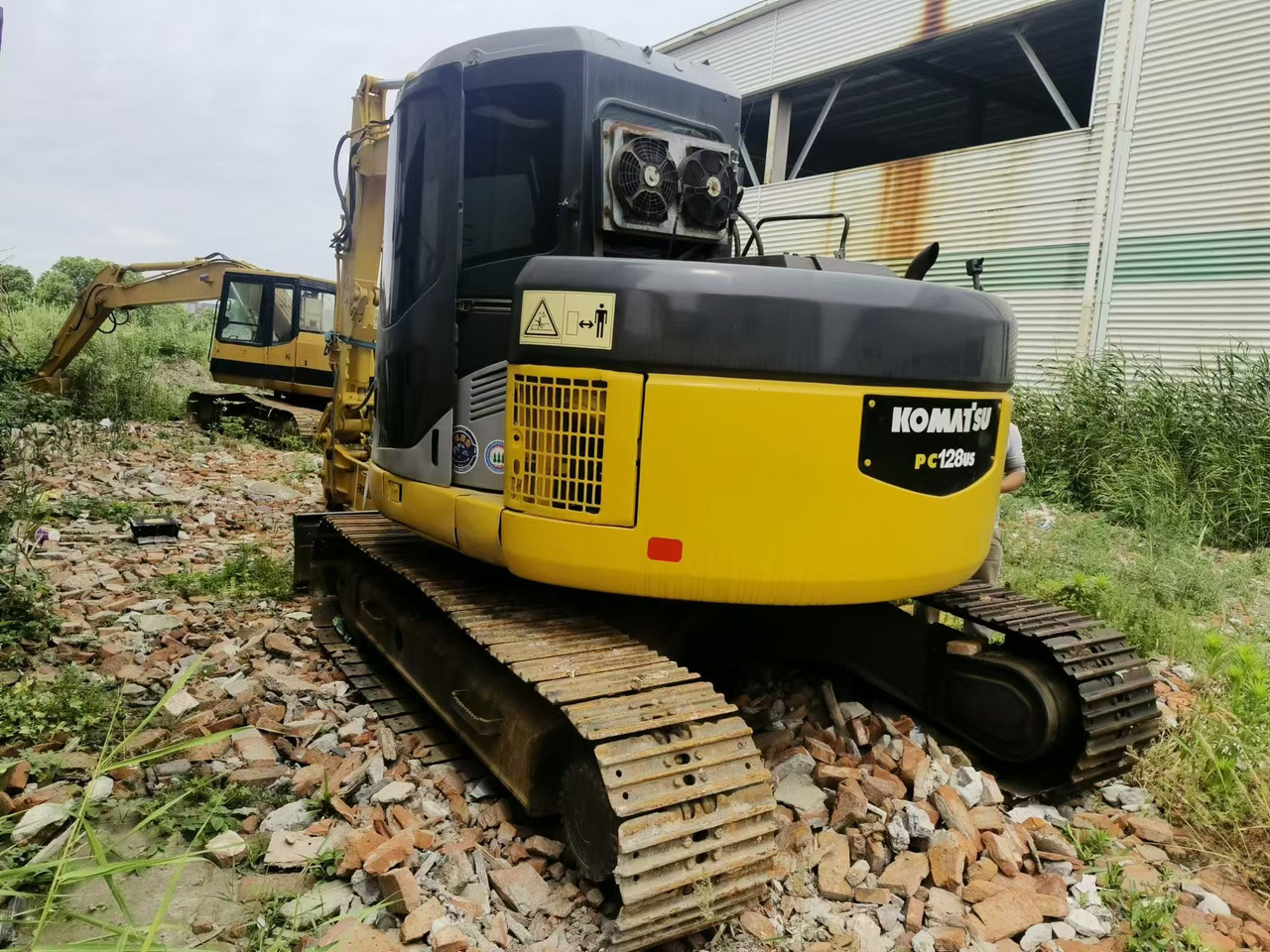 KOMATSU PC128US - Гусеничный экскаватор: фото 2 KOMATSU PC128US - Гусеничный экскаватор: фото 2