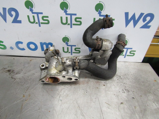 HINO 300 SERIES (N04C) THERMO STAT HOUSING - Двигатель и запчасти для Грузовиков: фото 1