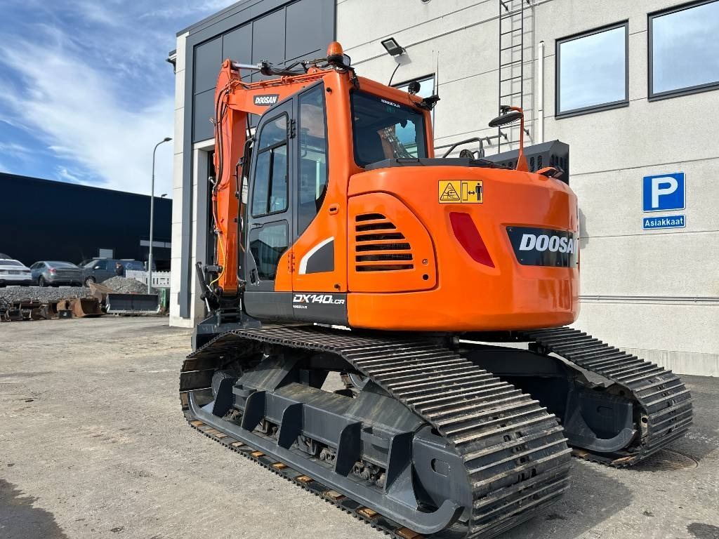 Doosan DX 140 LCR-5 metsäalusta - Гусеничный экскаватор: фото 2 Doosan DX 140 LCR-5 metsäalusta - Гусеничный экскаватор: фото 2