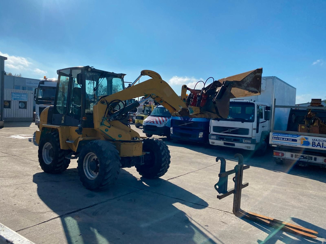 Ahlmann AS 90. Schwenk/Radlader. Klappschaufel + Gabel. - Колёсный погрузчик: фото 1 Ahlmann AS 90. Schwenk/Radlader. Klappschaufel + Gabel. - Колёсный погрузчик: фото 1