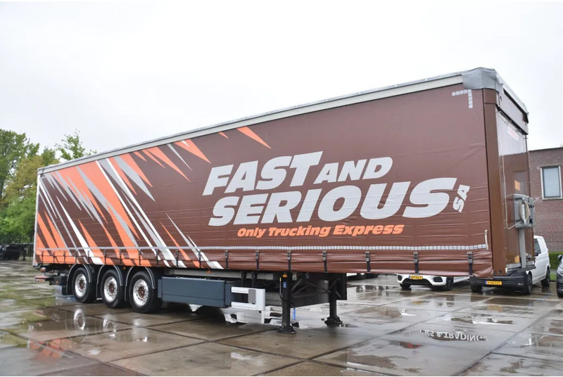 Fruehauf SLIDING CURTAINS/ROOF - TOPLIFT SYSTEM - LIFT AXLE - STEERING AXLE - SAF AXLES - ALCOA'S - DHOLLANDIA - TOP CONDITION - - Тентованный полуприцеп: фото 1 Fruehauf SLIDING CURTAINS/ROOF - TOPLIFT SYSTEM - LIFT AXLE - STEERING AXLE - SAF AXLES - ALCOA'S - DHOLLANDIA - TOP CONDITION - - Тентованный полуприцеп: фото 1