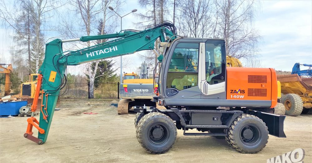 Hitachi ZX140W-3 - Колёсный экскаватор: фото 1