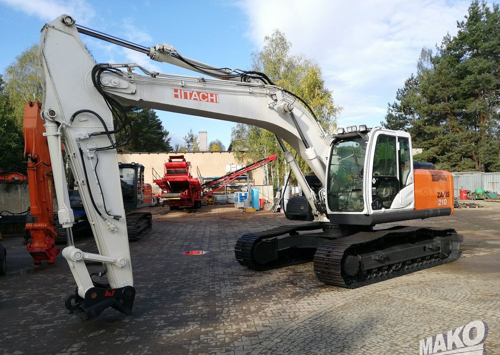 Hitachi ZX210 LC-5B - Гусеничный экскаватор: фото 1 Hitachi ZX210 LC-5B - Гусеничный экскаватор: фото 1